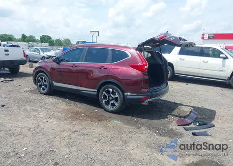 2017 Honda Cr-V Touring из США, поврежденный, VIN 7FARW1H94HE021174